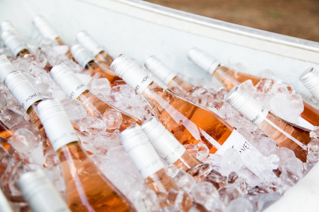 Bottles upon bottles of rosé filled the other side of the canoe