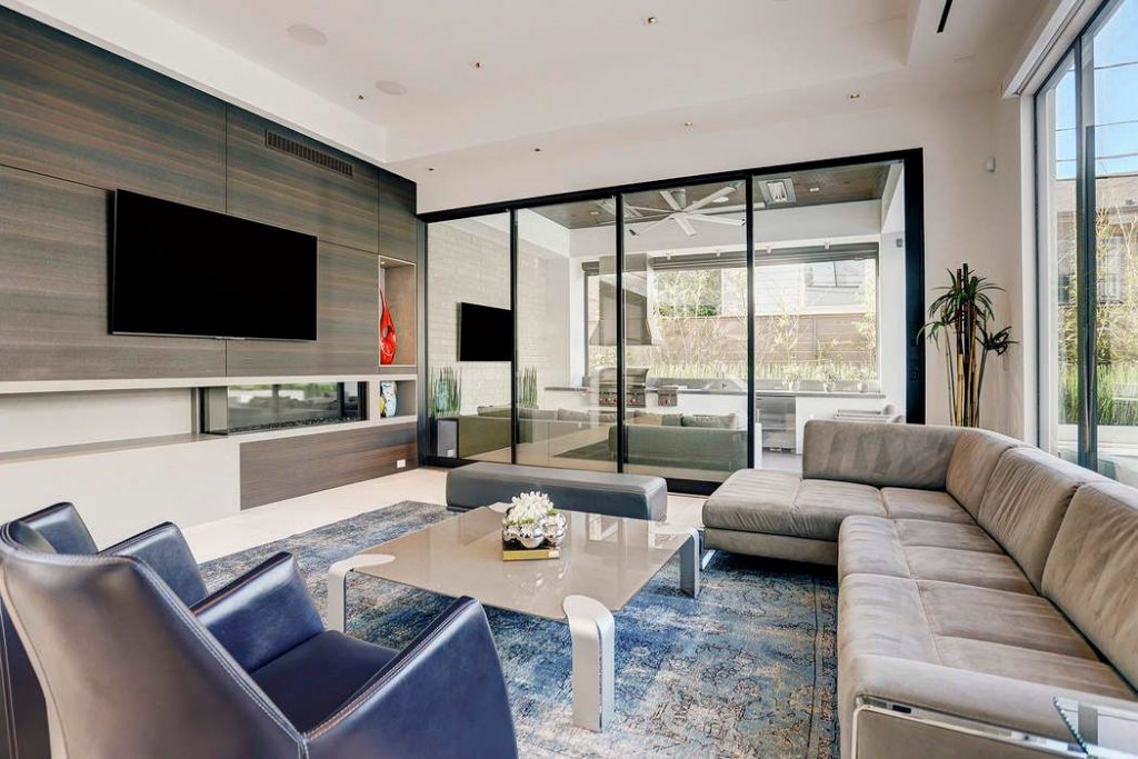 The den is welcoming and spacious with double-height ceilings. 