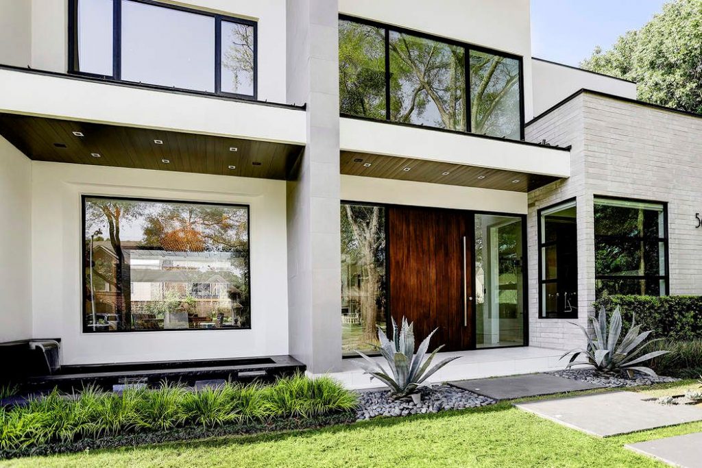 Natural light floods in through the many glass walls. 