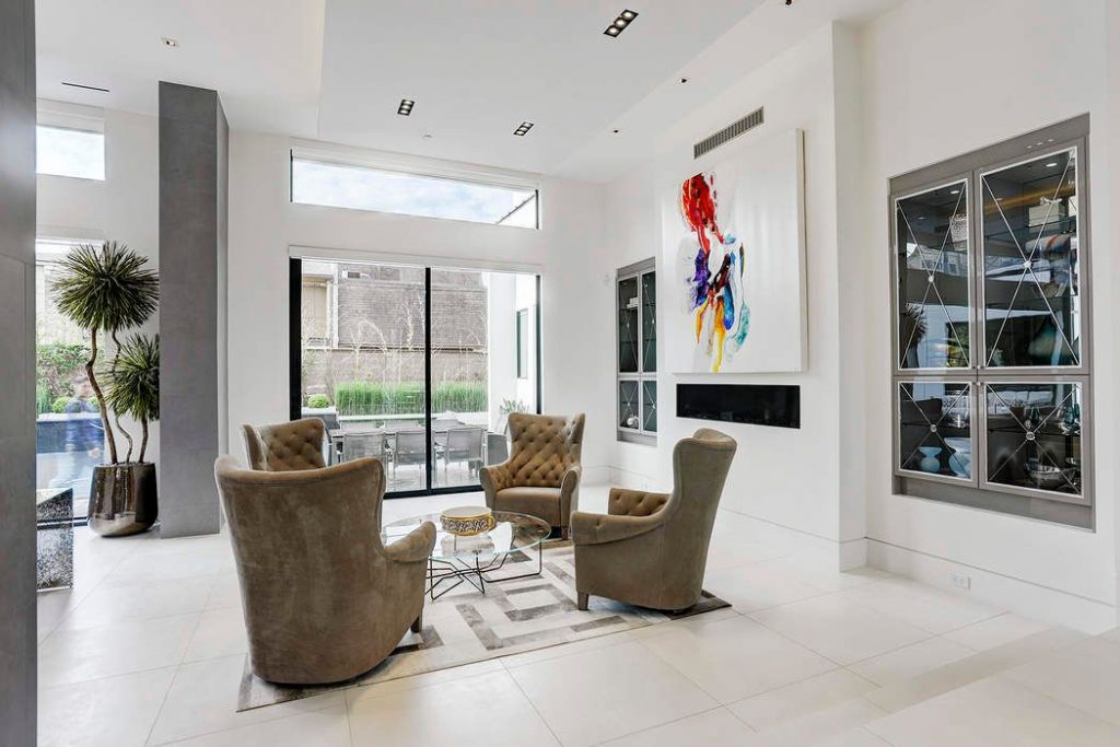 The modern fire place is perfect for warming up winter evenings. 