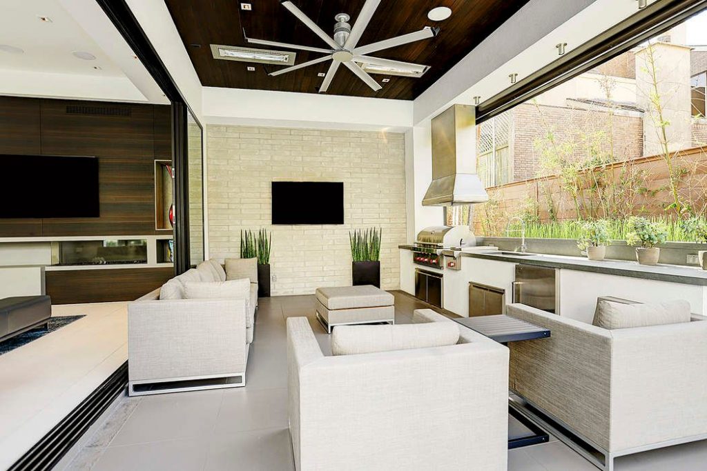 The outdoor living room is perfect for relaxing al fresco. 