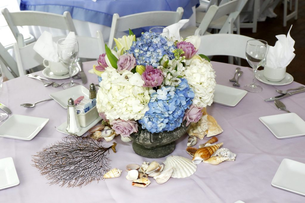 The table settings were inspired by the nautical theme. 
