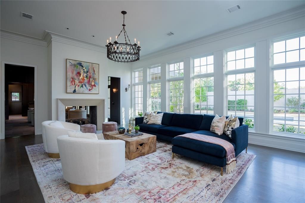 The family room's expansive windows look over the rear garden.