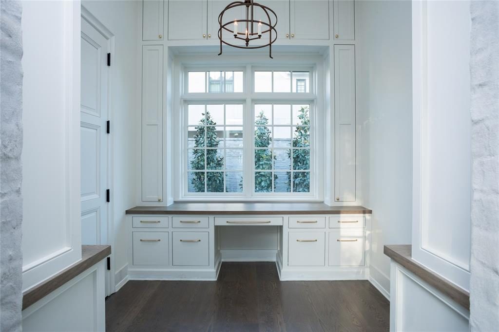 Builder homes tend to have home offices similar to this one, with plenty of built-ins, including the desk.