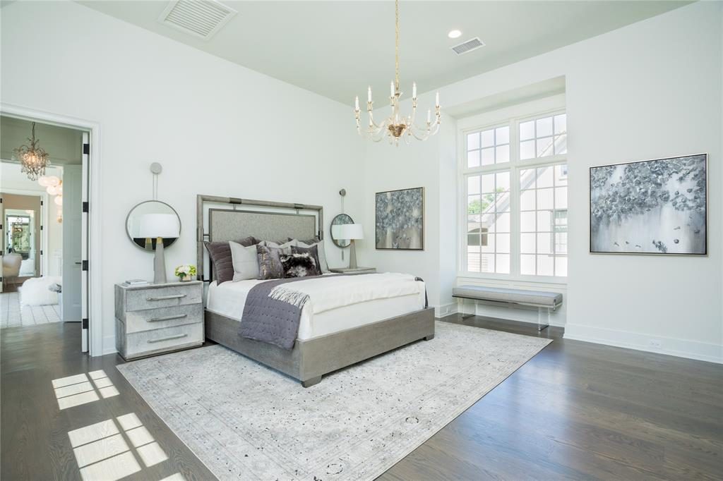 The serene master bedroom has its own fireplace with gas logs. 