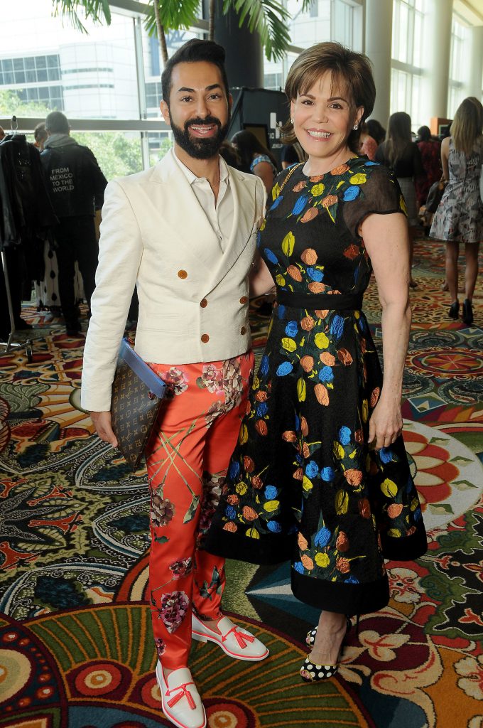 Fady Armanious and Hallie Vanderhider at the Latin Women's Initiative Annual Fashion Show & Luncheon at the Hilton Americas Hotel Friday  May 11 ,2018.(Dave Rossman Photo)