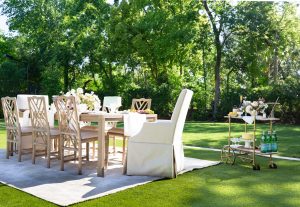 Don't be afraid to bring indoor furniture outside to create an intimate vibe.