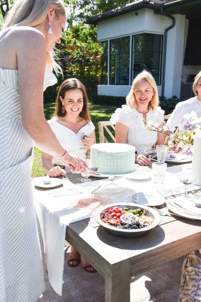 Lindsey Rose King serves up cocktails for Marie Flanigan and Marcia Smart