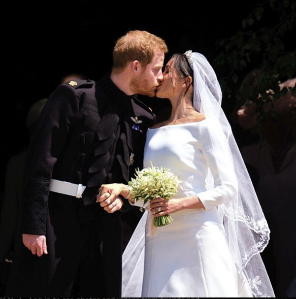Prince Harry and Meghan Markle seal their union with a kiss. @theroyalfamily