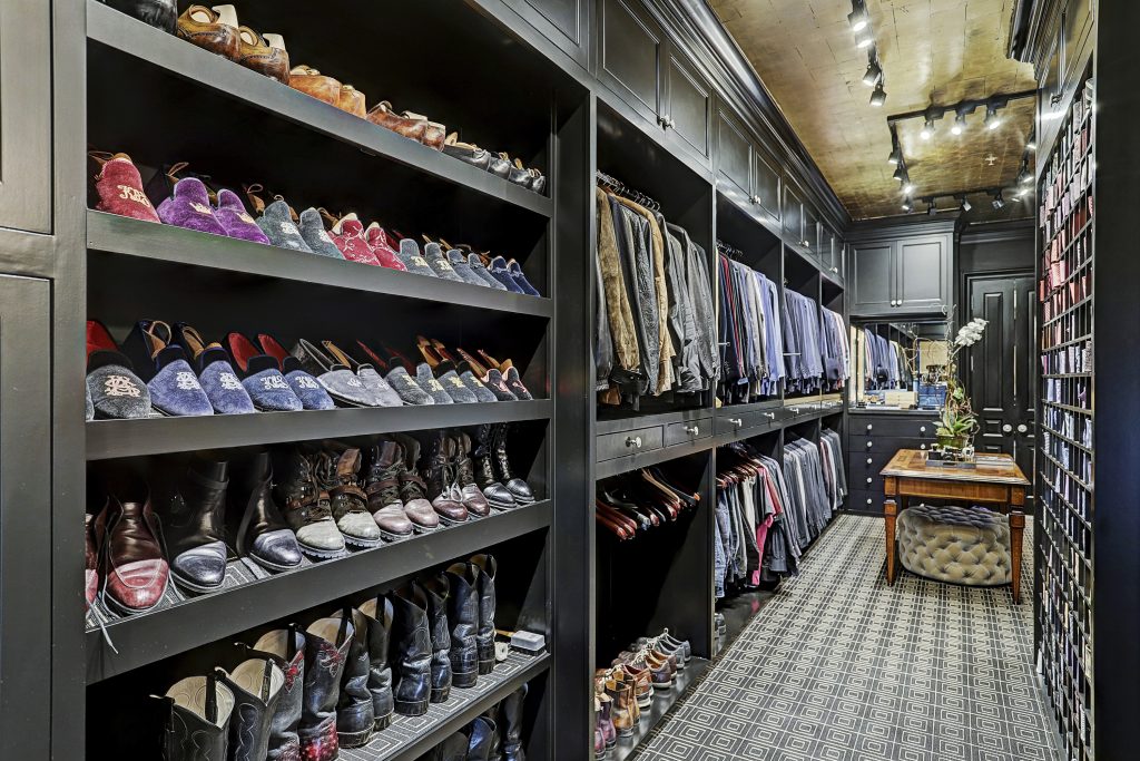 Not only does this closet in a Houston townhouse have room for 260 ties, it also has a self-winding watch cabinet in one of the walls.
