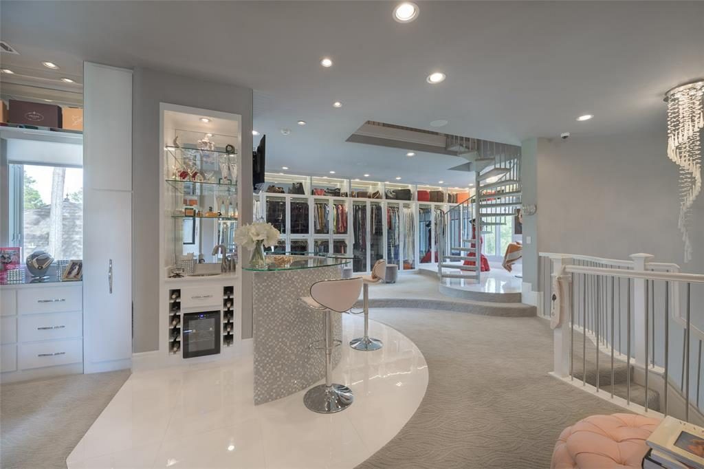 The ultimate closet, belonging to Theresa Roemer, more resembles a chic fashion boutique than residential closet. 