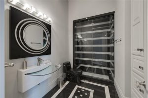 Three story closet black white bathroom