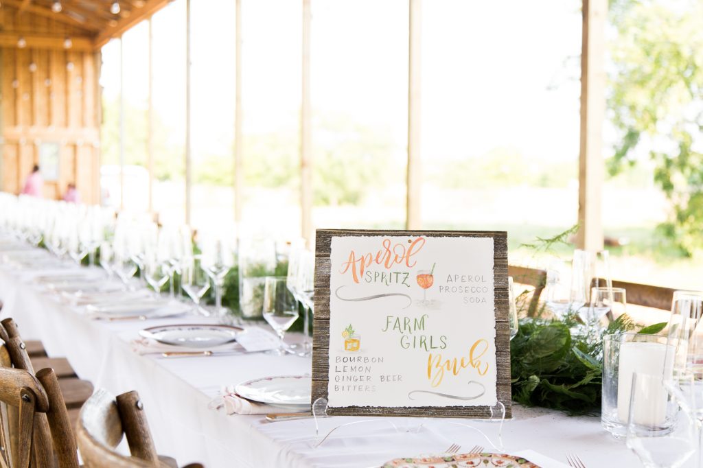 Two refreshing specialty cocktails were served to guests upon arrival. Sign by Nancy B. Creative.