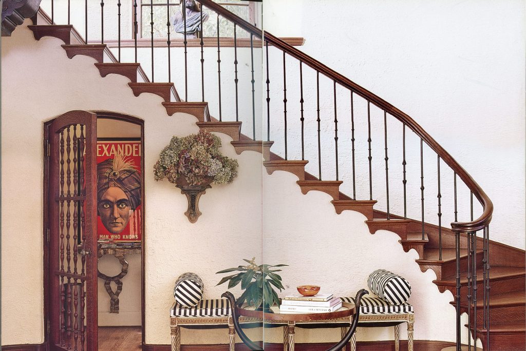 The dramatic staircase in Mickey Rosmarin's 1923 Mediterranean-style home showcases the discerning eye of its late owner, the founder of Tootsies. Vignettes from the home designed by architect Wiliam Ward Watkin will be staged by Judy Robinson Estate Sales. (Photo Tria Giovan)