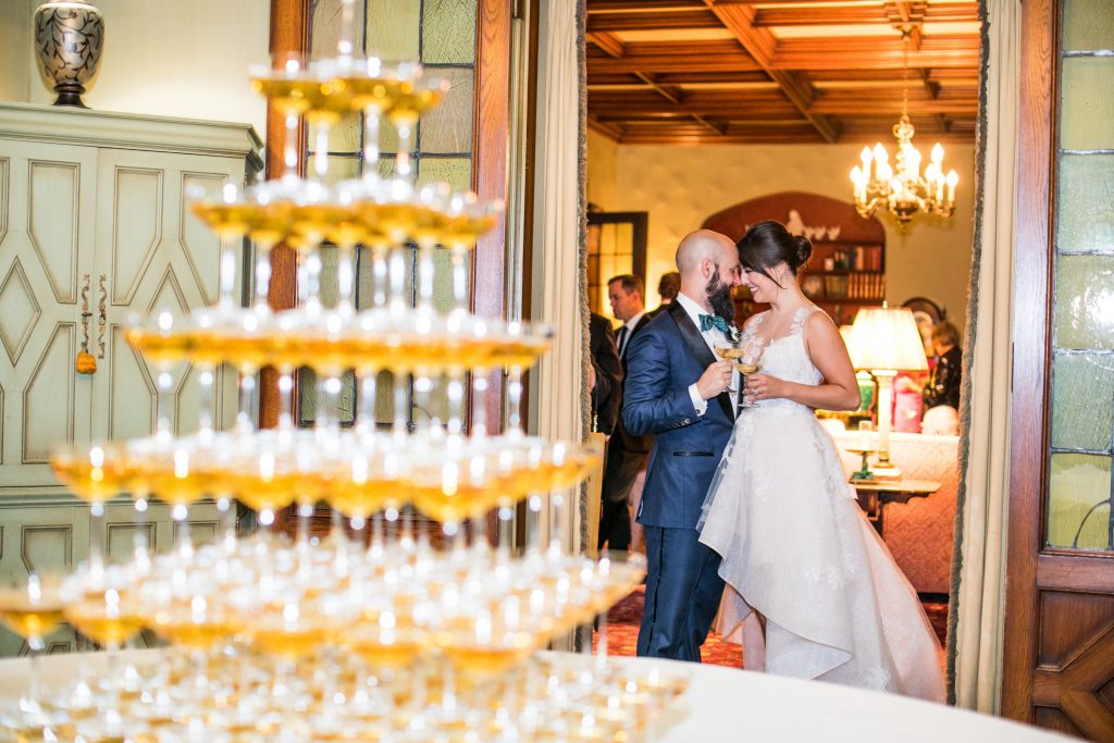The newlyweds toasting to a lifetime of love (Photo by Samuel Lippke Studios)