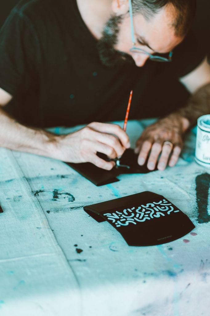 Each piece of the limited edition collection is hand-painted by the artist. 