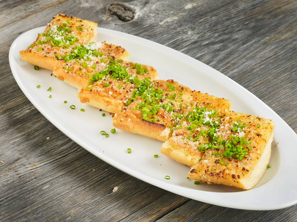 Carmelo's has mastered the classics, starting with their buttery garlic bread. 