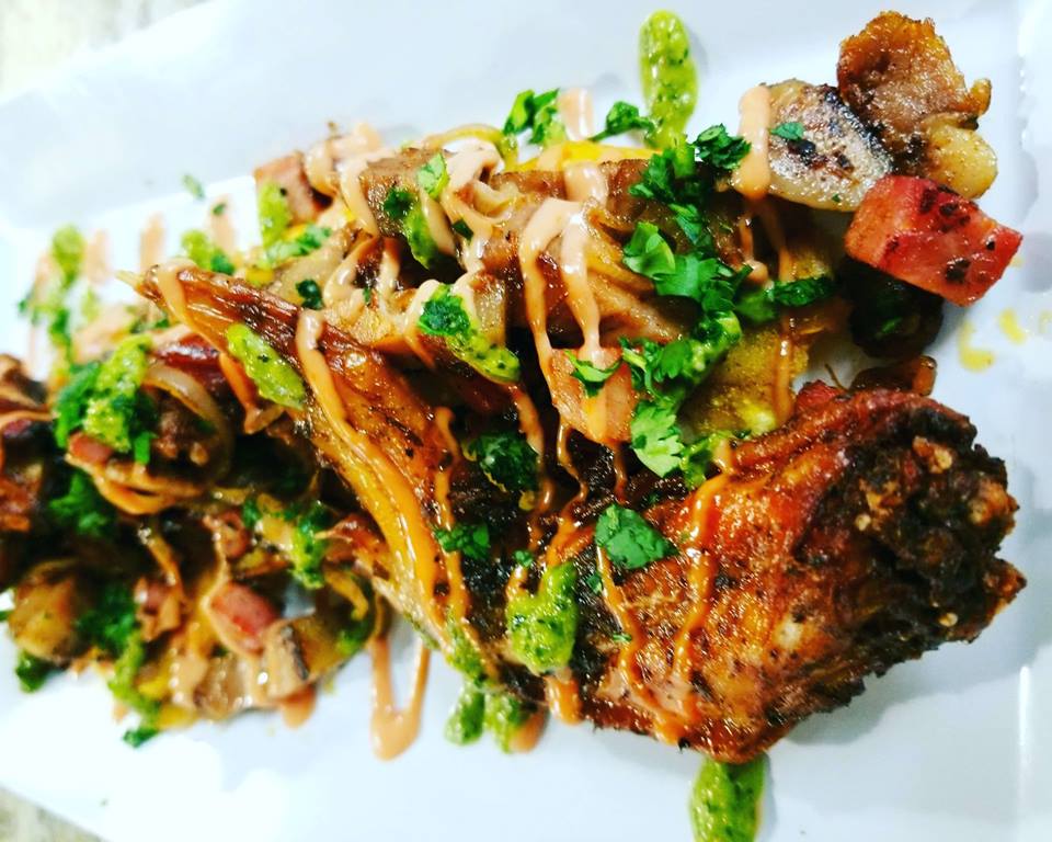 Sofrito found its home in an operational car wash. 