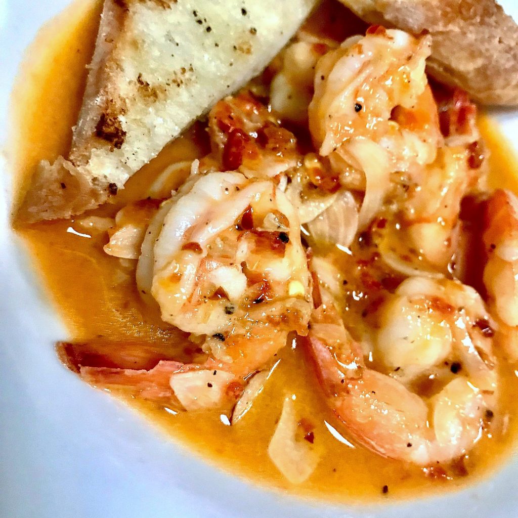 One Fifth Romance Languages' spicy shrimp gives happy hour a real kick. (Photo by Chris Shepherd.)