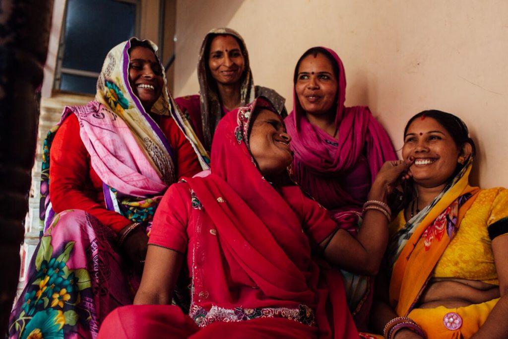 Craftswomen in India produce handmade pieces from jewelry to pillows, major factor of the brand