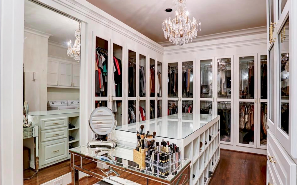 This master closet in Houston's Crestwood enclave features enclosed hanging space, a guaranteed buffer to dust and moths.