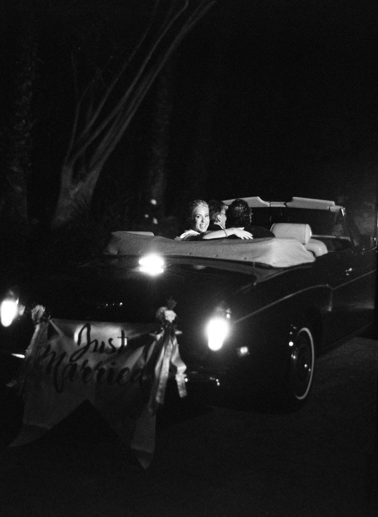 The couple leaves the Bel Air home after a send-off. The wedding was originally planned to take place in Santa Barbara, but they switched to L.A.