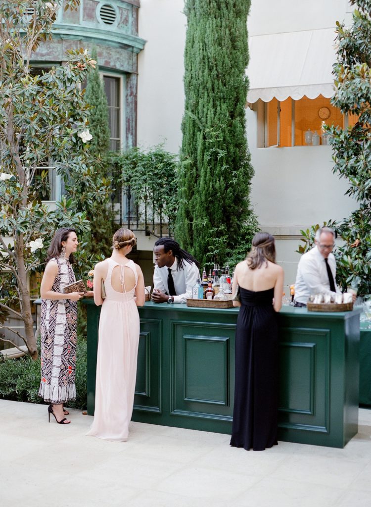 The decor mimicked the house with the high-gloss green of the bar matching exactly to the paint color of the home’s front door. (Photo by Jose Villa)