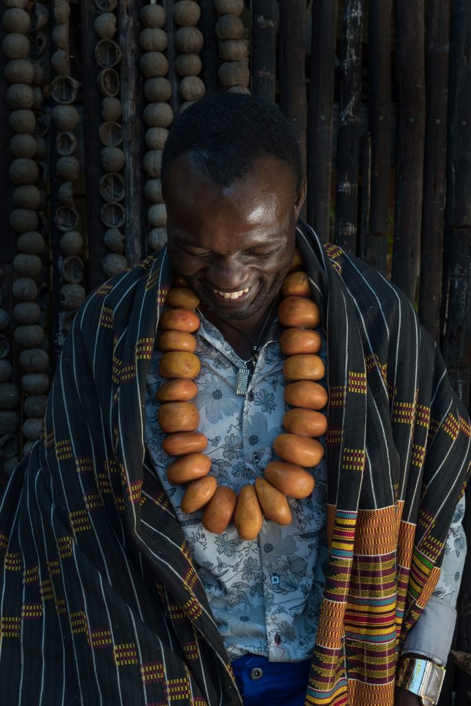 Kanju artisan with his wares