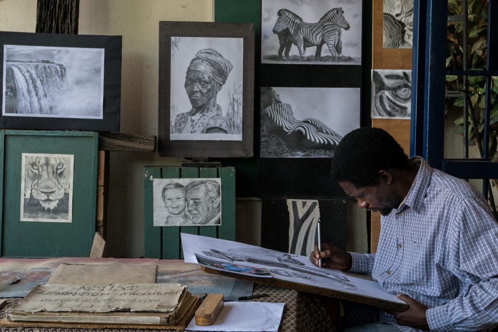 A Kanju fine artist at work