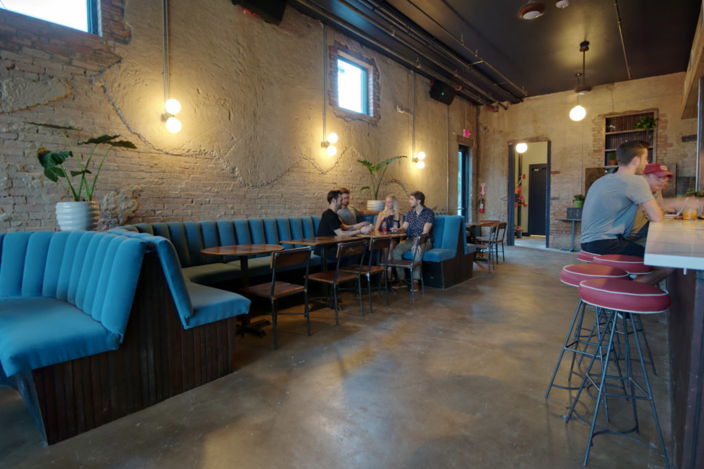 The bar has a rustic, Euro-influenced look.