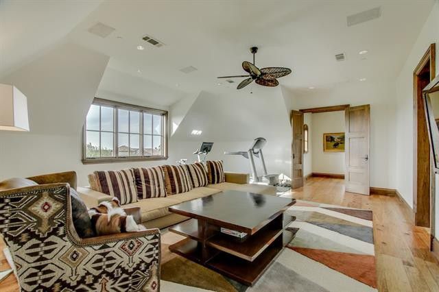 The tv room is every bit as elegant. 