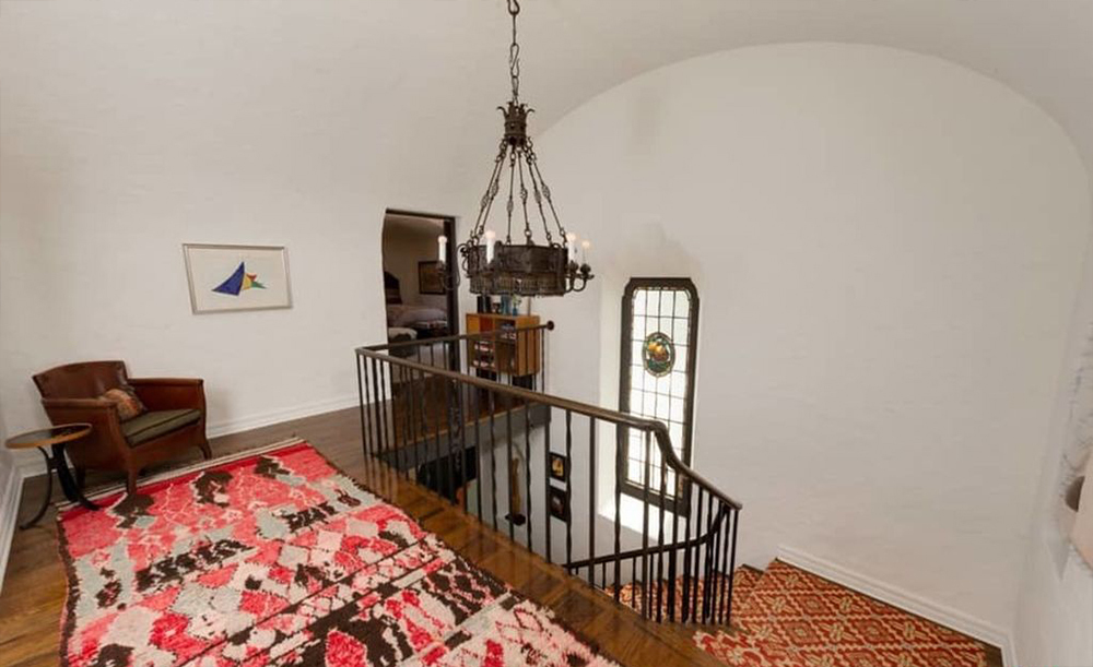 Unexpected carpeting adds to the home's unique flair. 