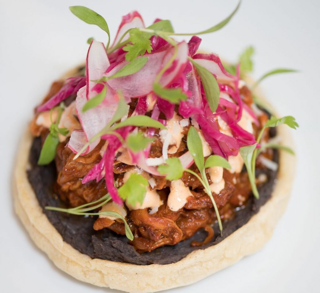 The cabrito sopes at new Houstonian hotel restaurant Tribute are a surprising twist on the classic tostada. 