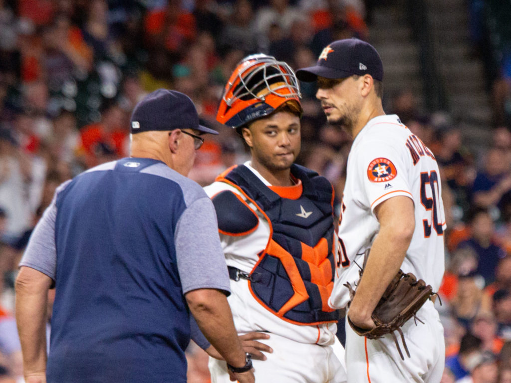 Charlie Morton and catcher Martin Maldonado take a moment. (Photo by F. Carter Smith.)