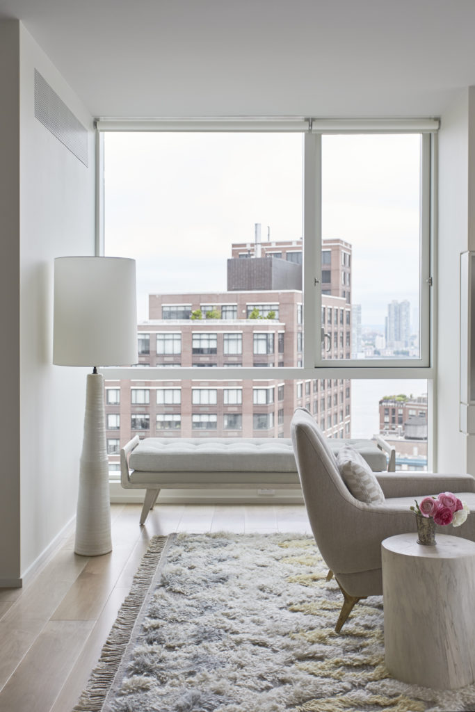 At this Tribeca apartment, it's all about the windows. The shades had to be J Geiger.