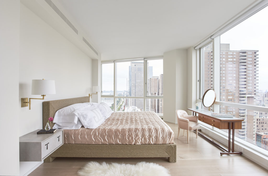 The J Geiger Shading System works in spaces featuring walls of windows as this Tribeca apartment shows.