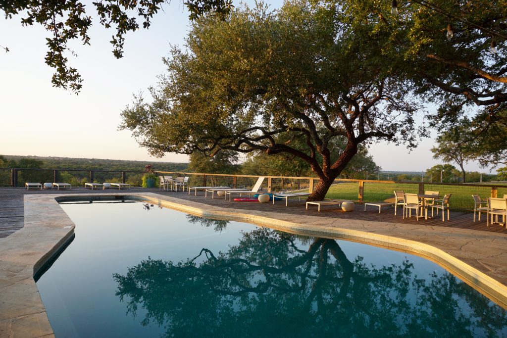 The pool and hot tub overlook miles of prairie. 