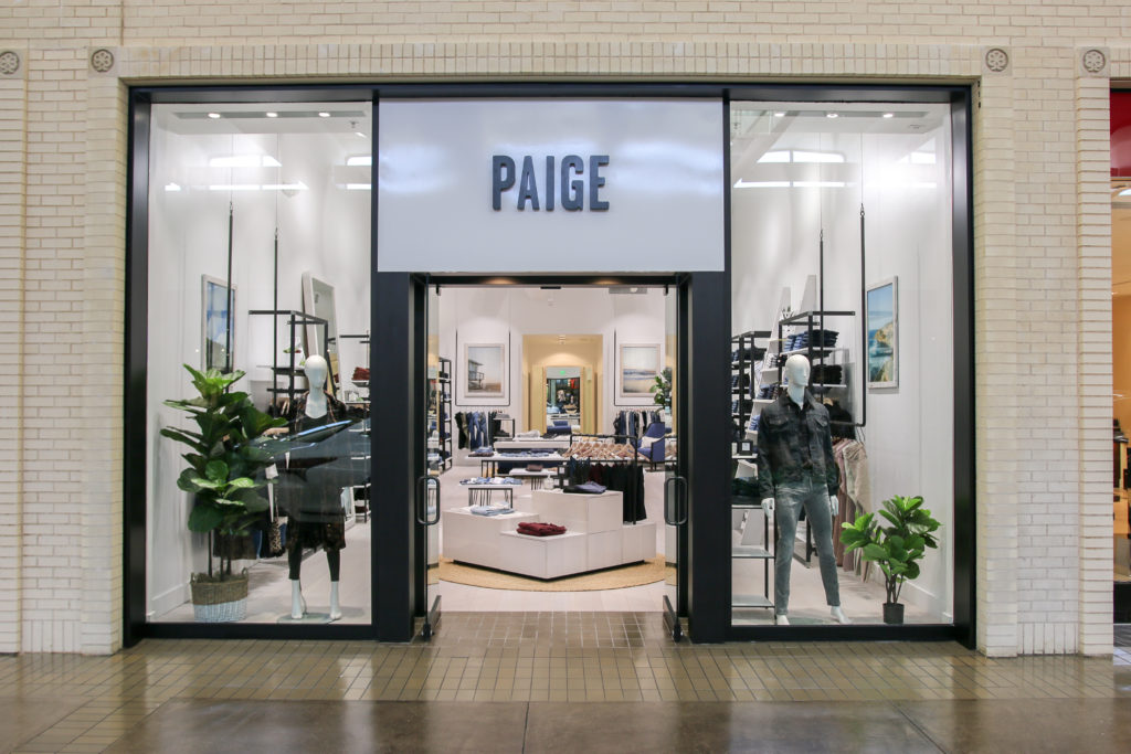 Paige Dallas is on the first floor between Tumi and Robert Graham.