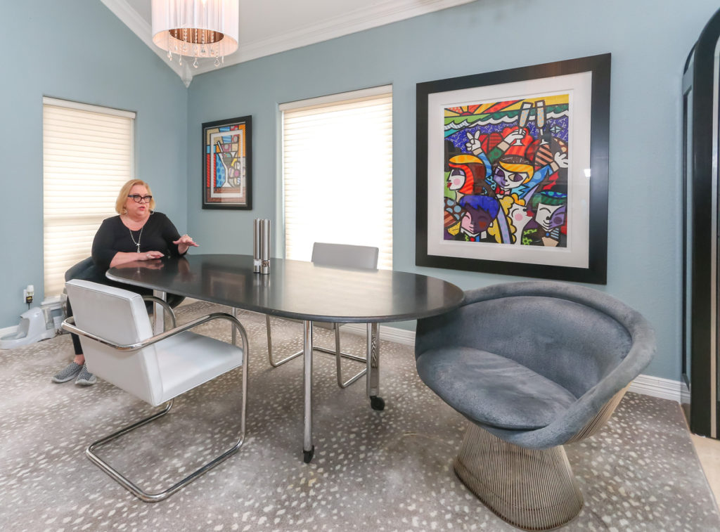 At Jayne Edison's Galveston Bay casa, mid-century dining at its finest: All original, Knoll Platner, Knoll Pascal, and Tubular Brno with Romero Britto's "Celebration."