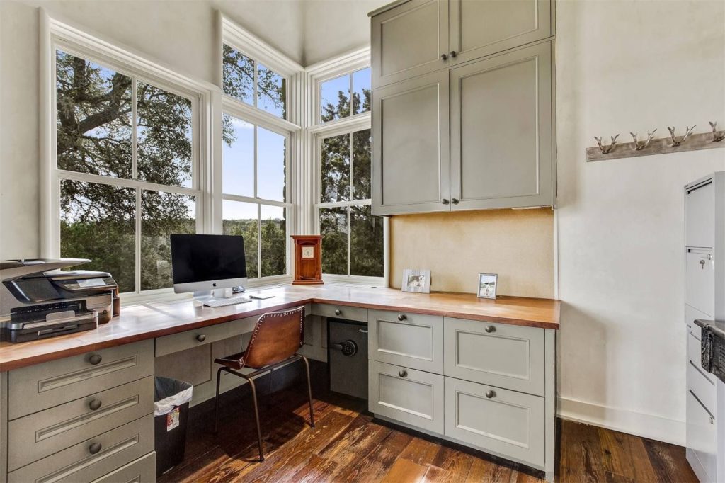 This office comes with its own wood-burning fireplace. 