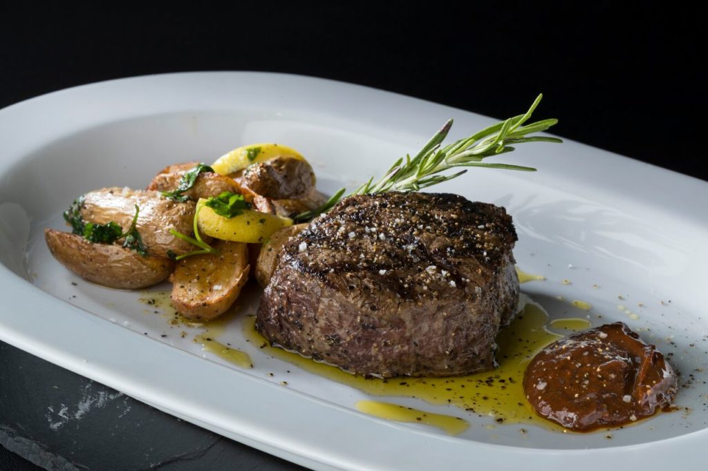 The signature steak sauce has garlic and mushrooms. 