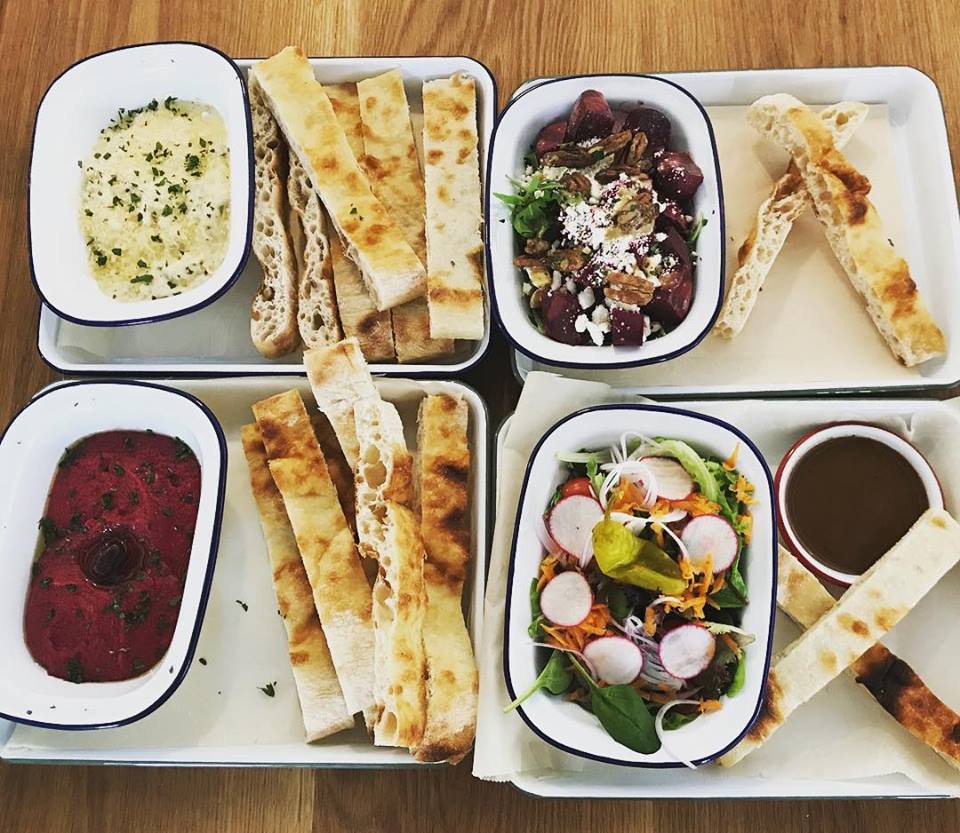 Pizza Motus' pizza bianco is perfect for dipping in artichoke dip, beet salad, beet hummus and Palatine salad. 