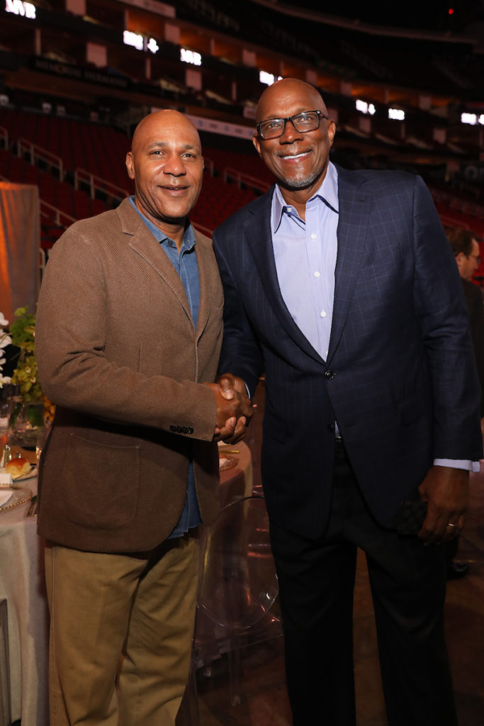 Former Houston Rockets greaats Mario Ellie and Clyde Drexler, photographed here at a Children's Memorial Hermann dinner at Toyota Center, were among the surprise guests roasting Rudy-T on Dave Ward's podcast.
