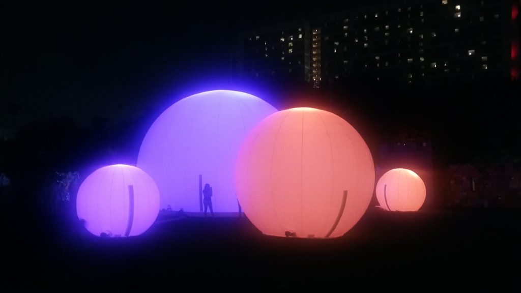 Orbs up to 30 feet in diameter captivate Houston audiences after dark at Discovery Green. (Photo Catherine D. Anspon)