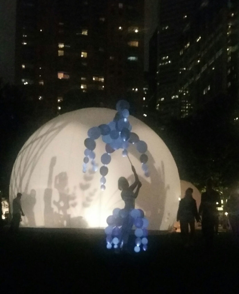 Opening night of moonGARDEN featured stilt-walkers. The art installation celebrates Discovery Green's tenth anniversary. (Photo Catherine D. Anspon)