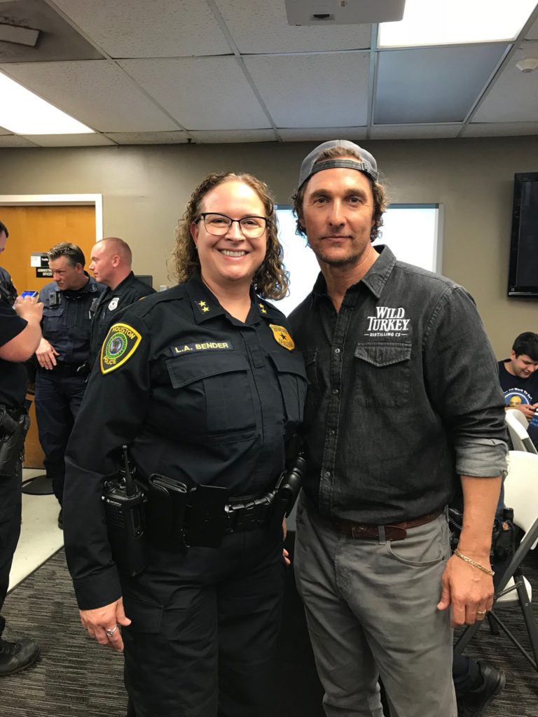 Matthew McConaughey posed with the officers. (Photo by @loriannbender)