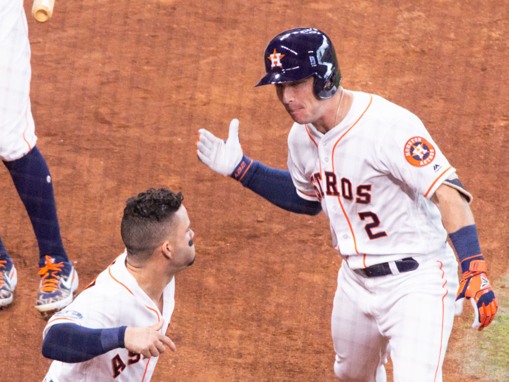Alex Bregman and Jose Altuve celebrate another Astros playoff moment. (Photo by F. Carter Smith.)