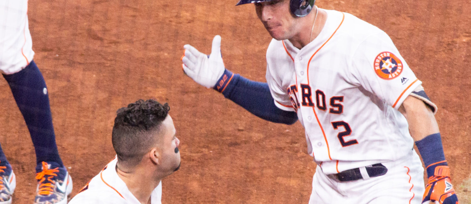 Alex Bregman and Jose Altuve celebrate another Astros playoff moment. (Photo by F. Carter Smith.)