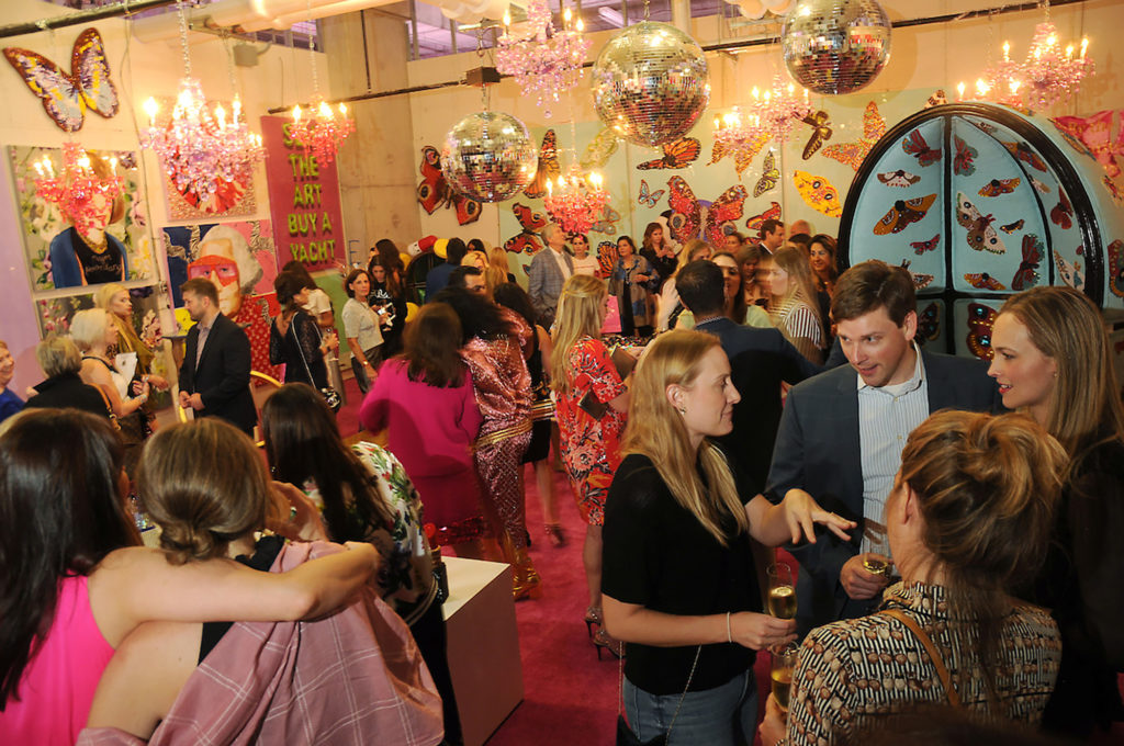 Guests at an art sale and party with Ashley Longshore at The Post Oak Hotel Thursday Oct. 04,2018.(Dave Rossman photo)