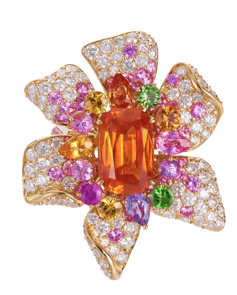 Starburst ring with centre Mandarin garnet surrounded by myriad of gemstones and diamonds in 18 karat yellow gold